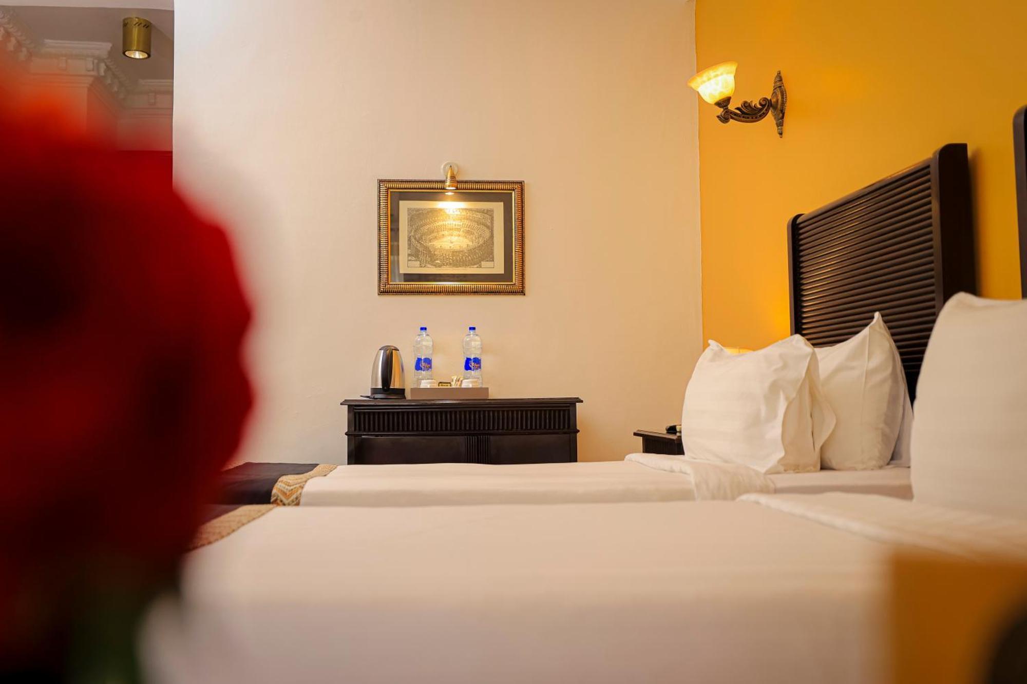 Colosseum Boutique Hotel & Spa Dar es Salaam Værelse billede