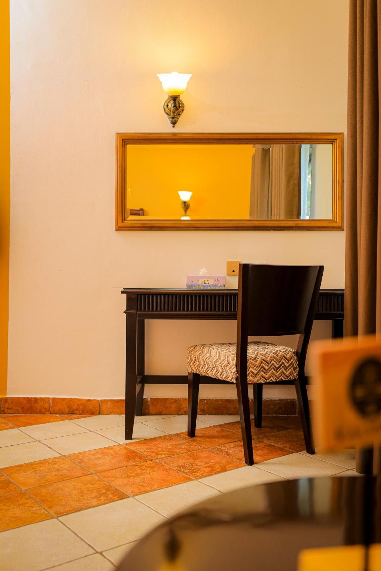 Colosseum Boutique Hotel & Spa Dar es Salaam Værelse billede